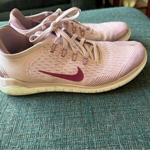 Purple Nike sneakers